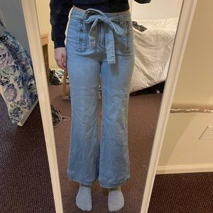 Anthropologie  belted tie flair cropped Jeans size 29